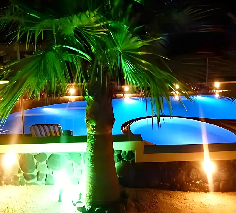The pool lit at night